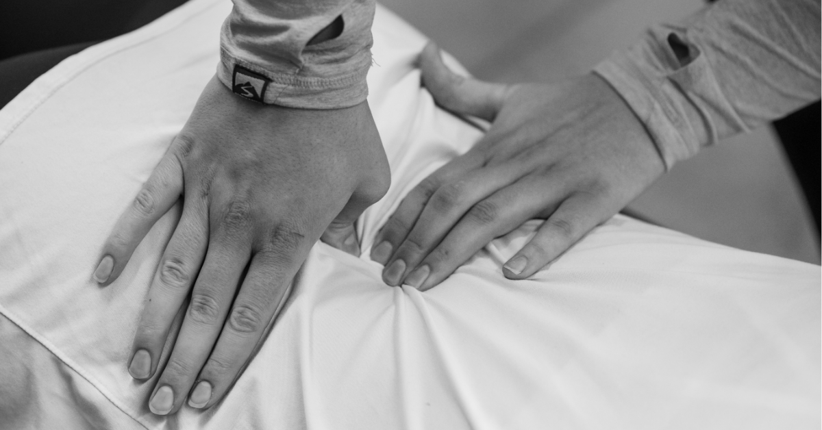 Close-up of Dr. Danielle Berger, DC performing a hands-on spinal adjustment at ChiroWay® of Duluth, focused on restoring function and reducing stress through chiropractic care.